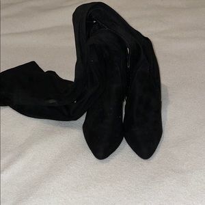 Thigh high black boots